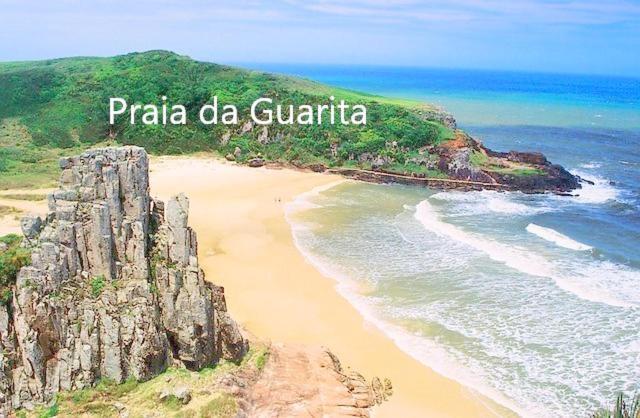 CASA completa em TORRES-RS - O MELHOR CUSTO BENEFICIO na mais bela praia Gaúcha - Cozinha - Banheiro - Ar condicionado - Smart TV 32 Android Apps Youtube - Netflix - Prime Vídeo e Wi-Fi - Estacionamento - Acomoda até 10 pessoas - Anfitriã Superhost n Villa Exterior foto